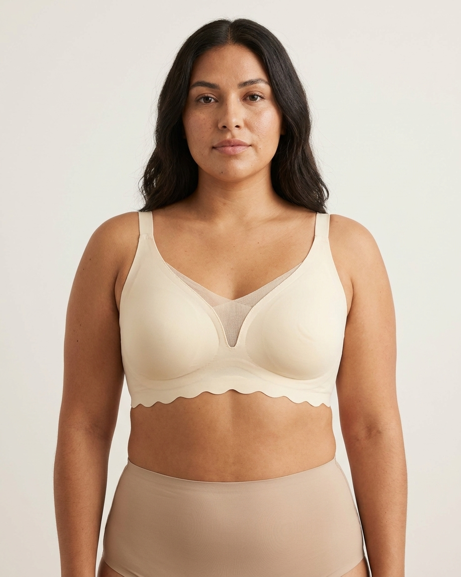 Woman wearing a beige Scalloped Gel Bra against a plain background