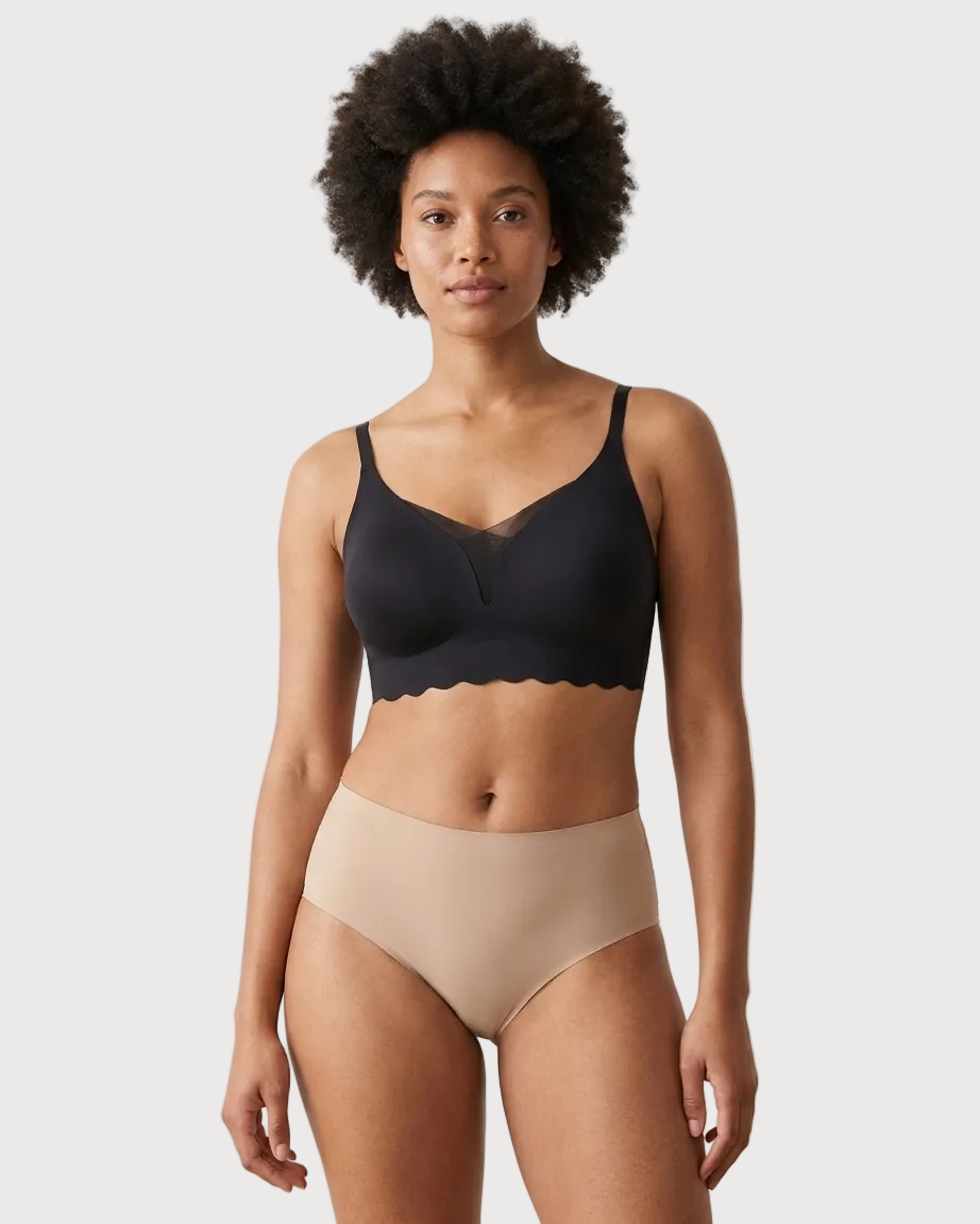 Woman wearing a black Scalloped Gel Bra against a plain background