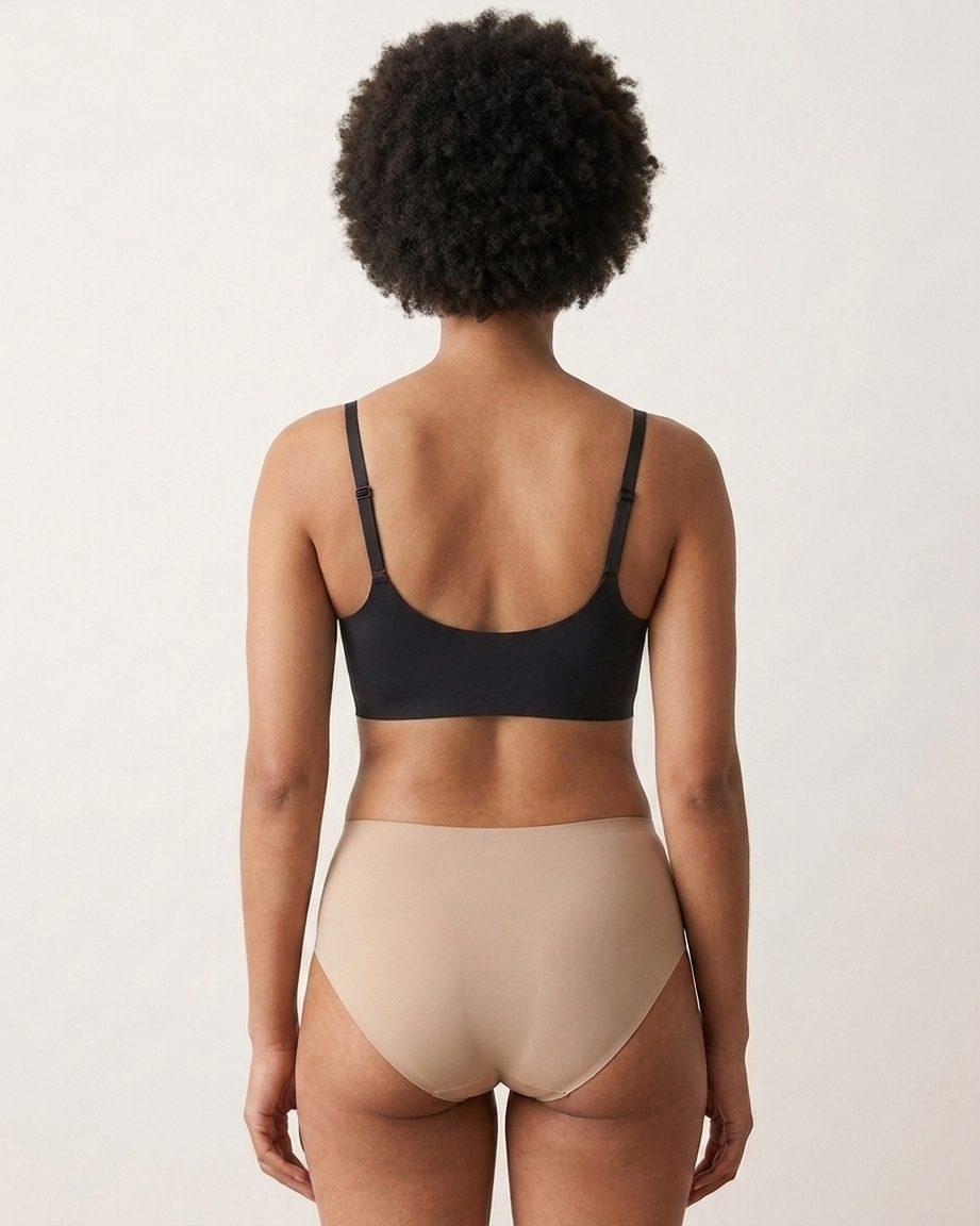 Back view of a woman wearing a beige Scalloped Gel Bra against a plain background