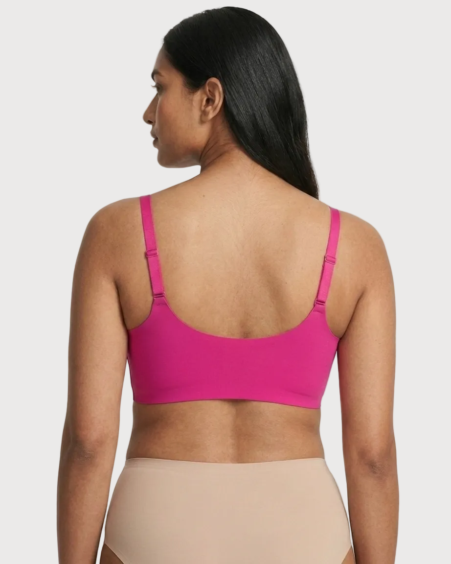 Back view of a woman wearing a pink Scalloped Gel Bra against a plain background