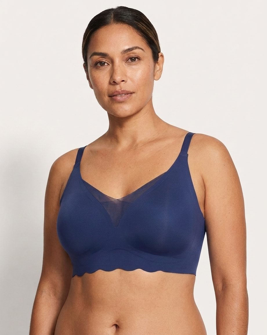 Woman wearing a navy Scalloped Gel Bra against a plain background