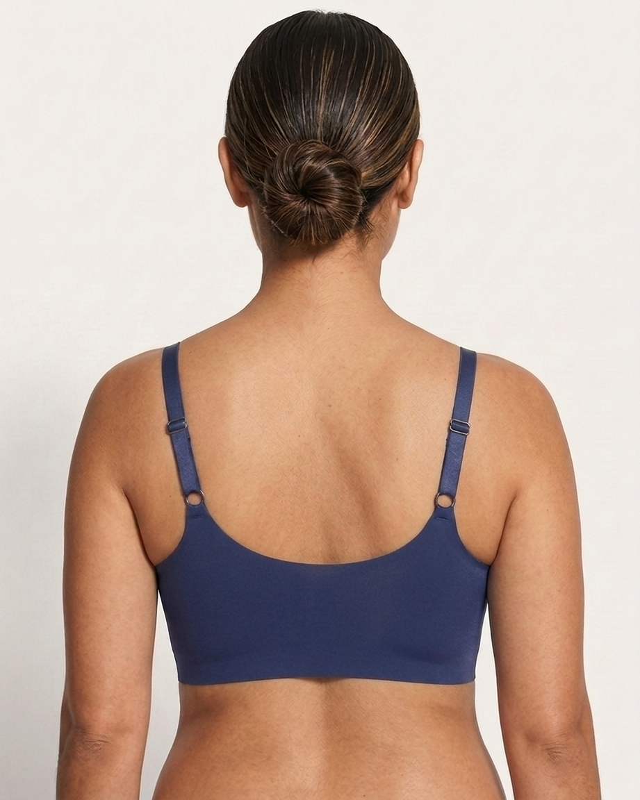 Back view of a woman wearing a navy Scalloped Gel Bra against a plain background