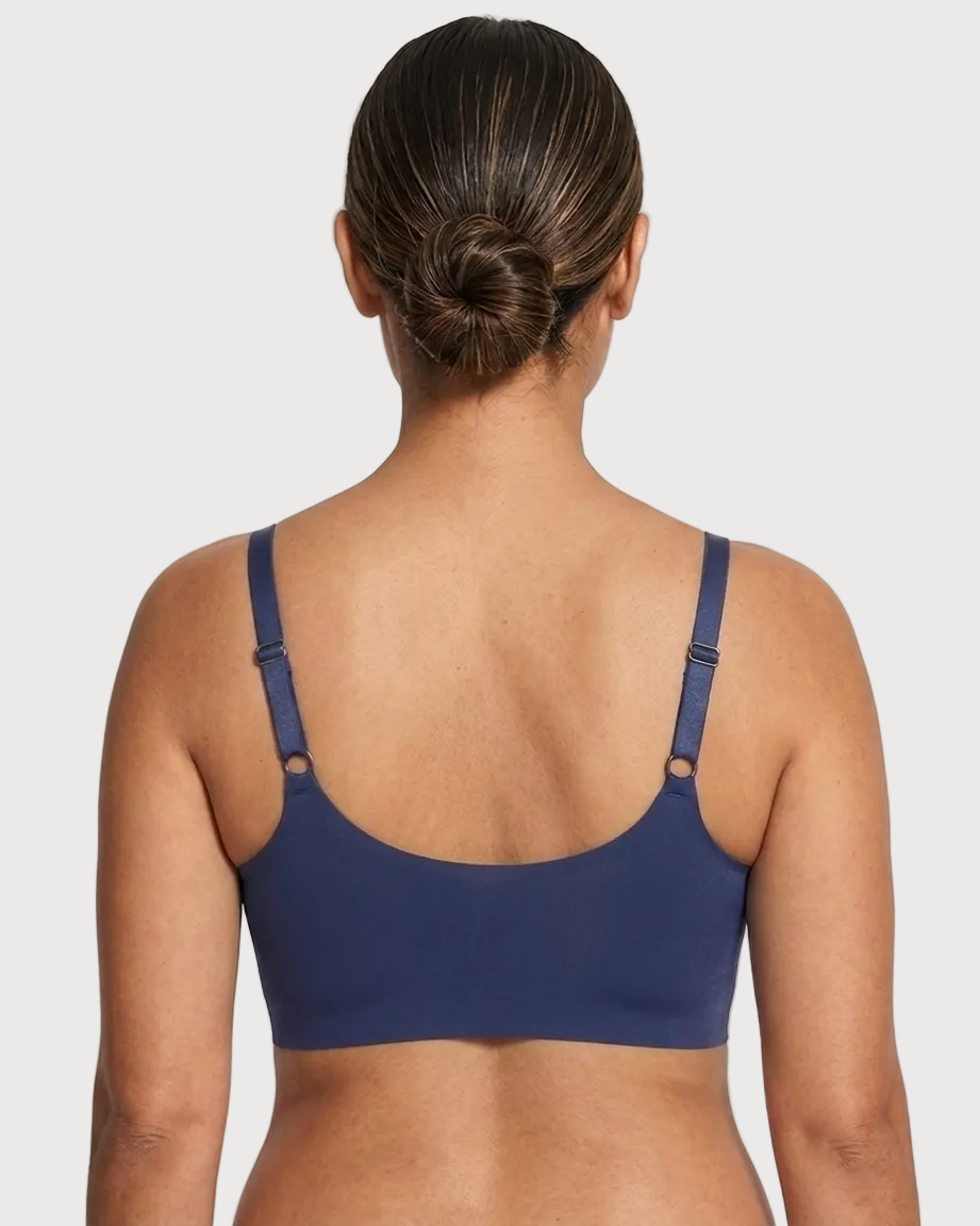Back view of a woman wearing a navy Scalloped Gel Bra against a plain background