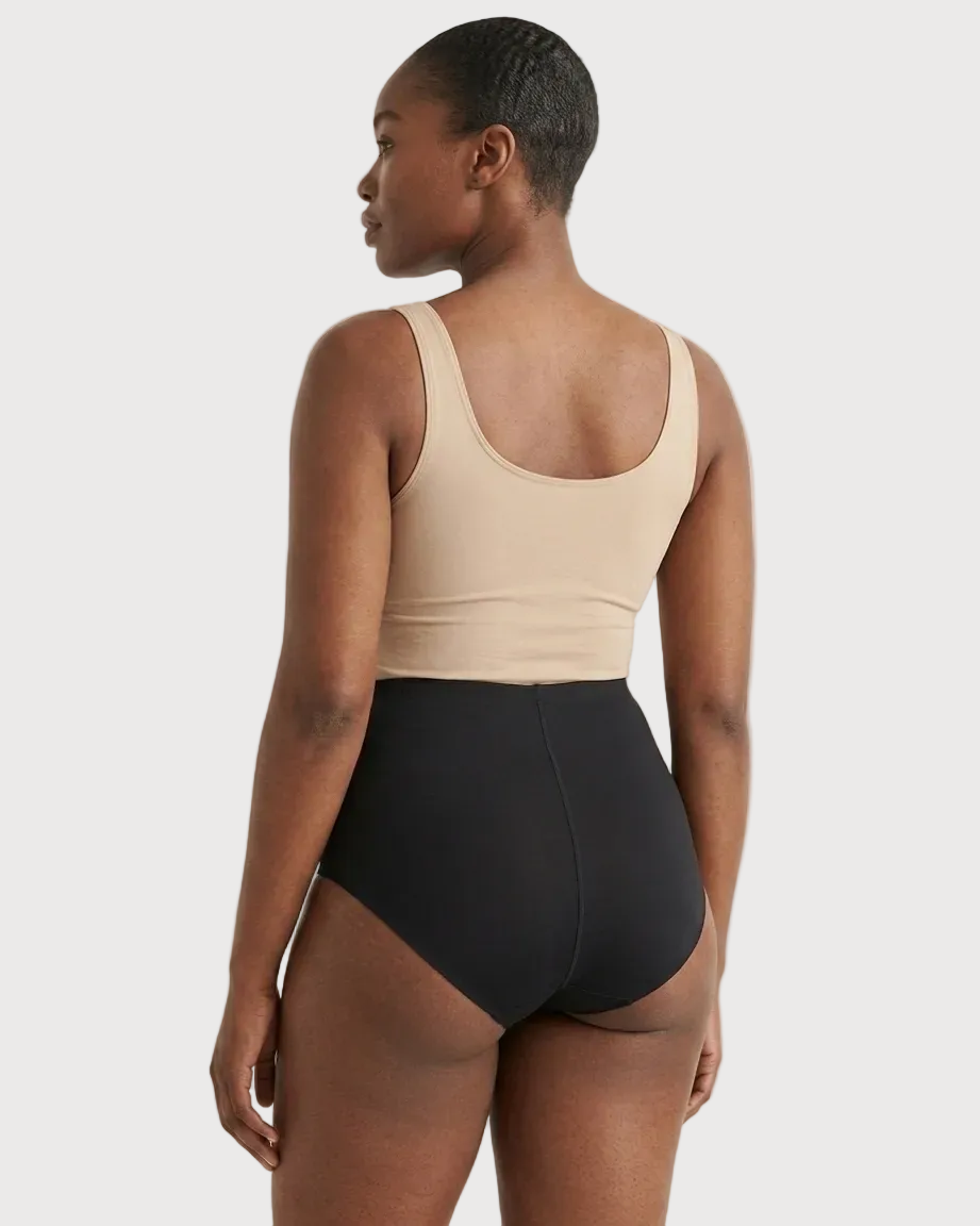 Backside of a woman wearing black Invisible Edge Scalloped Briefs against a plain background