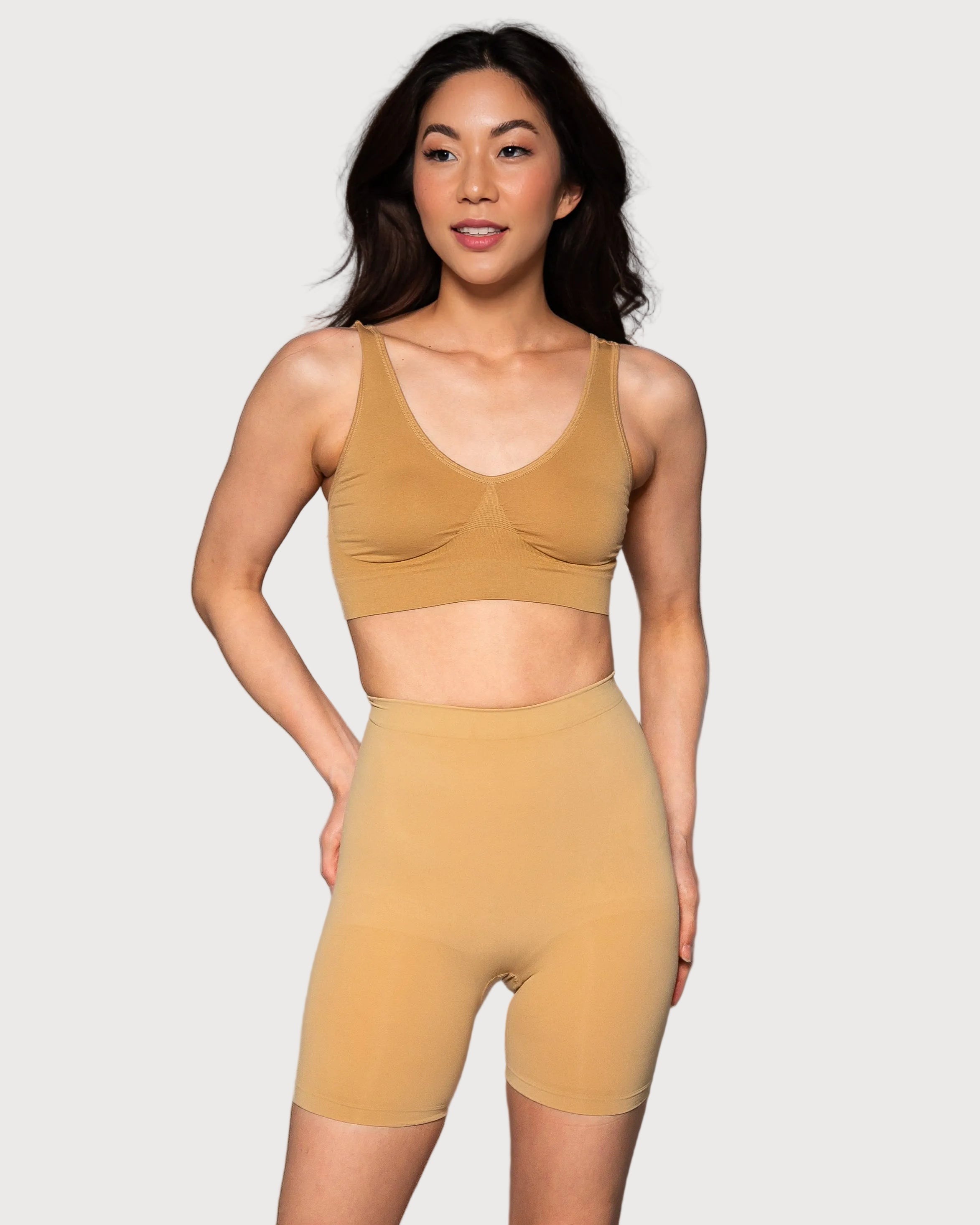 Beige Seamless Sculpt Mid-Thigh Shaping Short by Rhonda Shear — shapewear short for dresses, front view