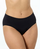 A close-up of a model wearing black Seamless Lightweight Brief against a plain white background.