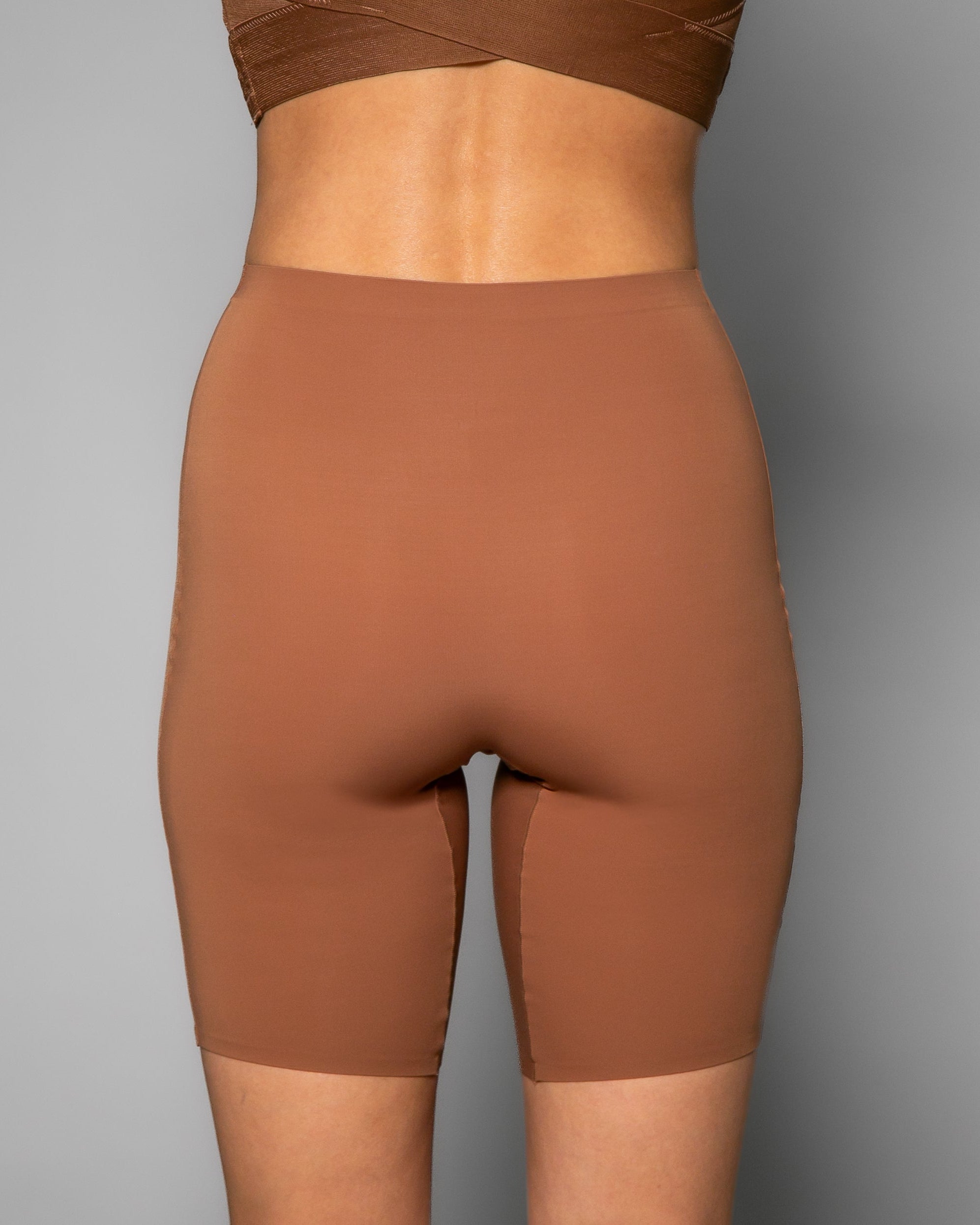 Mahogany Stretch Butterknit Longline Short by Rhonda Shear — high-waist biker short, back view