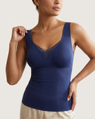 Woman wearing a Navy 9612 tank top against a plain background