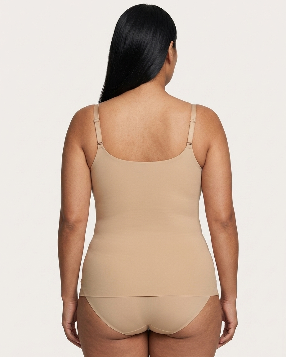 A woman shown from the back wearing a beige Adjustable Strap Butterknit Tank against a light gray studio background.